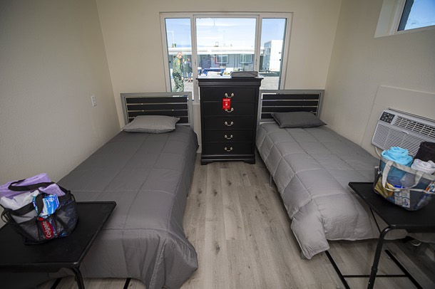 A room is shown during the official opening of the BETterment Community, on the site of the former Safari Motel, in downtown Las Vegas Thursday, April 6, 2023. The community will provide 90-day bridge housing and an array of supportive services that will allow homeless people to get back on their feet.