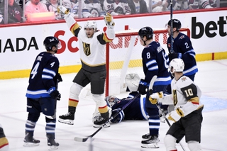Vegas Golden Knights' William Karlsson (71) celebrates after his goal against Winnipeg Jets' goaltender Connor Hellebuyck (37) during second-period Game 4 NHL Stanley Cup first-round hockey playoff action in Winnipeg, Manitoba, Monday April 24, 2023. 


