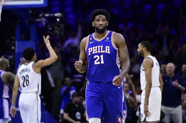 Philadelphia 76ers' Joel Embiid reacts after a score by Tobias Harris in the first half during Game 2 in the first round of the NBA basketball playoffs against the Brooklyn Nets, Monday, April 17, 2023, in Philadelphia. 


