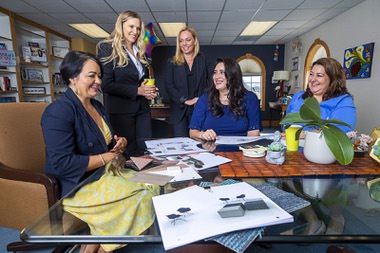 St. Jude’s Ranch for Children CEO Christina Vela, left, looks over interior samples and renderings with Nevada Women’s Philanthropy members at her office at St. Jude’s Ranch in Boulder City, Thursday, May 4, 2023. From left: Christina Vela, Dawn Mack, Becky MacDonald, Safari Ross, and Sonnya DeBonis. Nevada Women’s Philanthropy will grant $500,000 to St. Jude’s Ranch to fund a 2,450 square-foot welcome center and emergency shelter for children victims of sex trafficking. 
