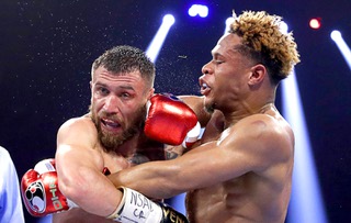 Vasiliy Lomachenko, left, and undisputed lightweight champion Devin Haney battle during their title fight at the MGM Grand Garden Arena Saturday, May 20, 2023. Haney retained his titles by unanimous decision.
