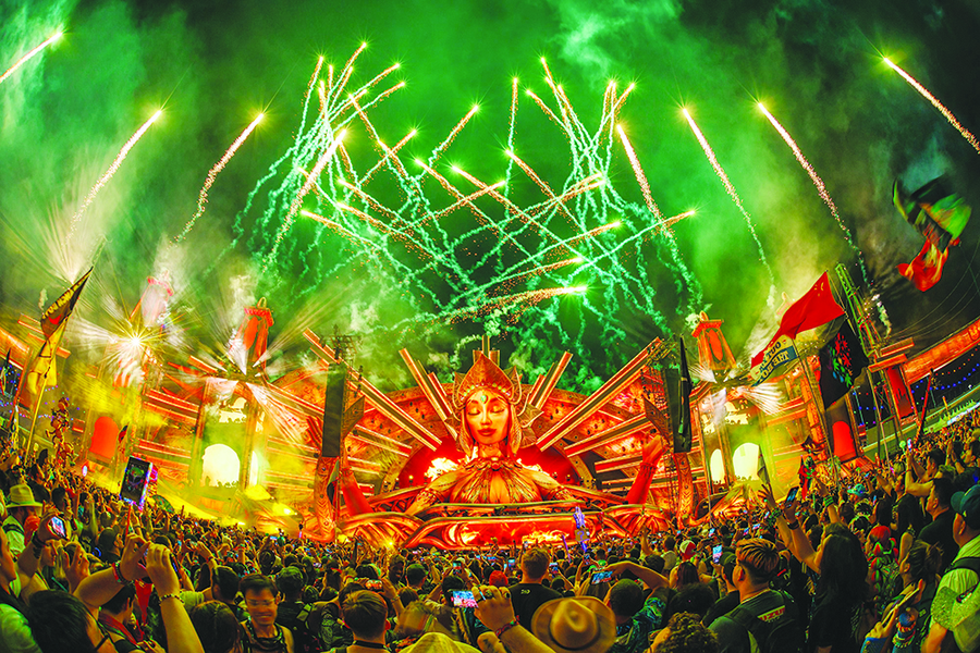 Fireworks light the sky over the Kinetic Field stage overnight May 22, 2023, on the first day of the Electric Daisy Carnival at the Las Vegas Speedway.