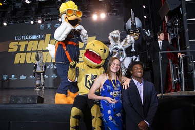 Female Athlete of the Year recipient Madeleine Hebert of Coronado High School and poses with Melvin Whitehead of Liberty High School, a Rising Star nominee, and mascots during the 2023 Sun Standout Awards at the South Point Showroom Monday, May 22, 2023. Mascots from left: Spruce the Goose, mascot of the Las Vegas Aviators, Chance the Golden Gila Monster, mascot of the Vegas Golden Knights, Buckets, mascot of the Las Vegas Aces, and Raider Rusher, mascot of the Las Vegas Raiders.