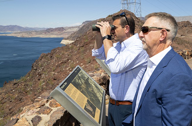 Congressman David Valadao, left, R-Calif., and Greg Walch, general counsel for the Southern Nevada Water Authority and the Las Vegas Valley Water District, look over Lake Mead during a tour and discussion at the Lakeview Overlook at Lake Mead Friday, May 26, 2023. The stop at the overlook was part of a tour of Southern Nevada hosted by Congresswoman Susie Lee, D-Nev., and a bipartisan exchange between the Representatives' Nevada and California districts.