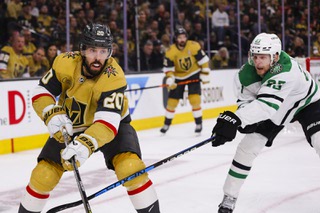 Vegas Golden Knights center Chandler Stephenson (20) carries the puck against Dallas Stars defenseman Esa Lindell (23) during the third period of Game 5 of an NHL hockey Stanley Cup Western Conference Final at T-Mobile Arena Saturday, May 27, 2023.
