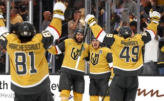 Vegas Golden Knights defenseman Zach Whitecloud, second right, celebrates with teammates after scoring against the Florida Panthers during the third period of Game 1 of the Stanley Cup Final at T-Mobile Arena Saturday, June 3, 2023. From left: Jonathan Marchessault (81), Nicolas Hague (14), Whitecloud, and Ivan Barbashev (49).