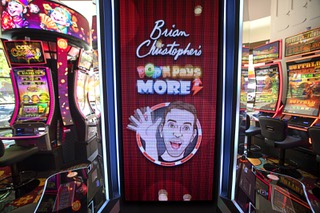 A video image of influencer Brian Christopher waves from a bank of Brian Christopher-themed slot machines in the Brian Christopher smoke-free slot area at the Plaza in downtown Las Vegas Tuesday, June 7, 2023. The new slot area, part of the Plazas Main Street Reimagination project, celebrated its grand opening on Saturday, June 10, 2023.