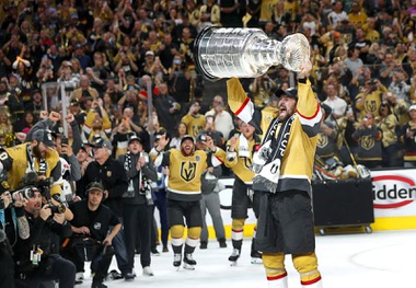 Vegas Golden Knights team captain Mark Stone (61) raises the Stanley Cup Trophy after the Golden Knights beat the Florida Panthers 9-3 in Game 5 to win the Stanley Cup Final at T-Mobile Arena Tuesday, June 13, 2023, in Las&nbsp;Vegas.