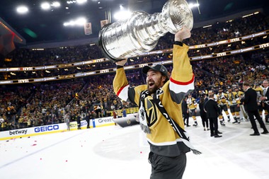 Vegas Golden Knights team captain Mark Stone (61) skates with the Stanley Cup Trophy after the Golden Knights beat the Florida Panthers 9-3 in Game 5 to win the Stanley Cup Final at T-Mobile Arena Tuesday, June 13, 2023, in Las&nbsp;Vegas.