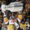 Vegas Golden Knights center Jack Eichel (9) skates with the Stanley Cup Trophy after the Vegas Golden Knights beat the Florida Panthers 9-3 in Game 5 to win the Stanley Cup Final at T-Mobile Arena Tuesday, June 13, 2023, in Las Vegas.