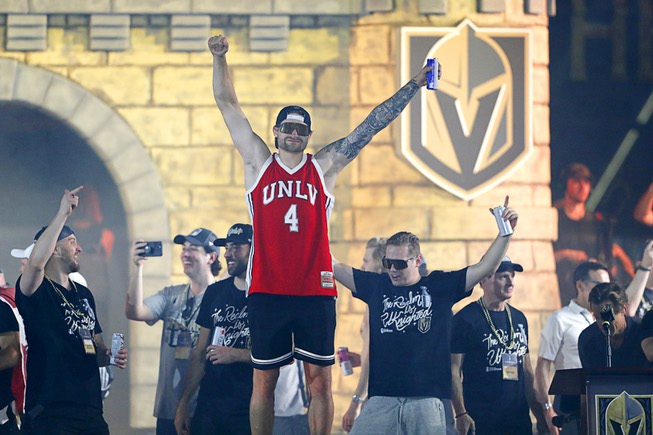 Vegas Golden Knights goaltender Adin Hill, wearing a UNLV jersey, celebrates during a Golden Knights victory rally at Toshiba Plaza Saturday, June 17, 2023. The Golden Knights defeated the Florida Panthers at T-Mobile Arena Tuesday to win the Stanley Cup Final.