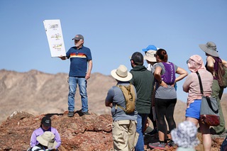 Retired UNLV geology professor Stephen Rowland, left, teaches geology of the area during a field trip with high school science teachers near Rainbow Gardens, west of the the Lake Mead National Recreation Area, Wednesday, June 21, 2023.