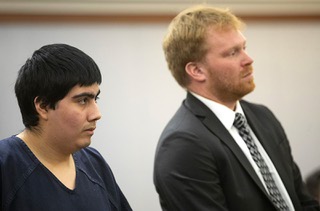 Jonathan Eluterio Martinez Garcia, left, stands with Tyler Gaston, chief deputy public defender, during sentencing at the Regional Justice Center in Las Vegas Wednesday, June 28, 2023. Martinez Garcia pled guilty to attempted murder and other charges in April in connection with an attack on his teacher at Eldorado High School in 2022.