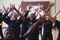 Children of all ages storm the floor of the auditorium at the Historic Fifth Street School in Downtown Las Vegas, singing and dancing with an electric sort of energy.