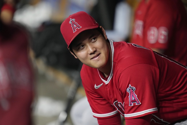 Los Angeles Angels designated hitter Shohei Ohtani is seen on the bench during the ninth inning of a baseball game against the Detroit Tigers, Tuesday, July 25, 2023, in Detroit.