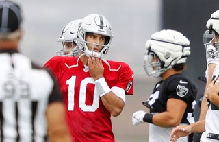 Raiders quarterback Jimmy Garoppolo (10) warms up with the team during Raiders Training Camp at the Raiders Headquarters/Intermountain Health Performance Center Tuesday, Aug. 1, 2023, in Henderson.