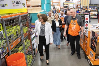Sen. Catherine Cortez Masto, left, D-Nev., looks over a locked cabinet of power tools and supplies while touring a Home Depot store on West Charleston Boulevard Wednesday, Aug. 2, 2023. Nevada politicians, members of law enforcement and retail representatives held a roundtable discussion at the store to promote a bill that will increase federal participation in fighting organized retail crime.