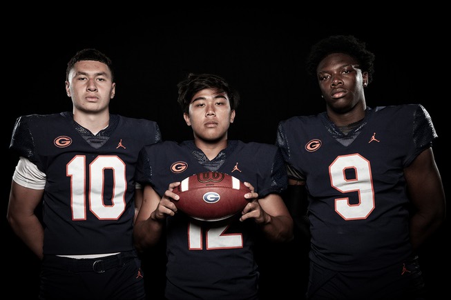 Members of the Bishop Gorman High School football team are pictured during the Las Vegas Sun's high school football media day at the Red Rock Resort on July 20, 2023. They include, from left, Charles Correa, Micah Alejado and Elija Lofton.