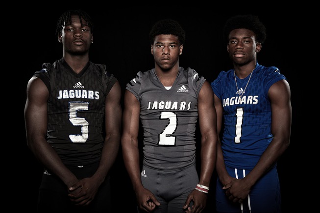 Members of the Desert Pines High School football team are pictured during the Las Vegas Sun's high school football media day at the Red Rock Resort on July 20, 2023. They include, from left, Greg Burrell, Damari Washington and Jaylen Allen.