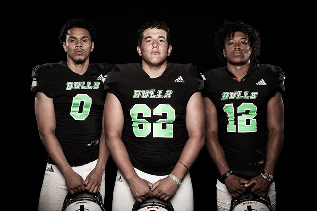 Members of the SLAM! NV High School football team are pictured during the Las Vegas Sun's high school football media day at the Red Rock Resort on July 20, 2023. They include, from left, Reese Womble, Andre Cade and Damian Nevil.