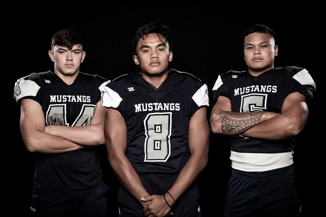 Members of the Shadow Ridge High School football team are pictured during the Las Vegas Sun's high school football media day at the Red Rock Resort on July 20, 2023. They include, from left, Aaron Coverdell, Coen Coloma and James Hadley.