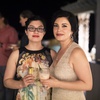 Lupita Arreguín, right, president and owner of Dos Caras, with her daughter Devon. 