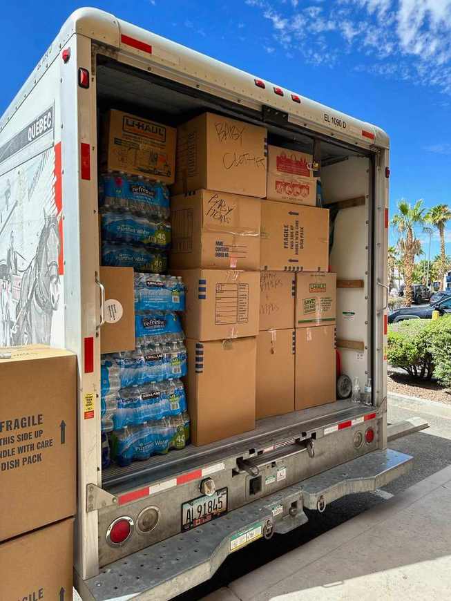 Donations collected at 2 Scoops of Aloha Las Vegas Drive Inn were packed into three 20-foot moving trucks like the one above, and included everything from toiletries, pallets of water, canned goods, clothes, diapers and baby food.