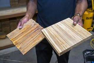 Owner Brooks Smith holds an unfinished chopsticks tile, left, and a sanded and planed tile at ChopValue Las Vegas Wednesday, Aug. 16, 2023. The company recycles used chopsticks from restaurants and turns them into a variety of products.