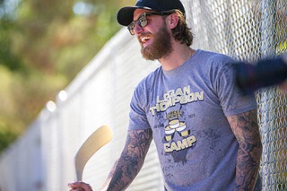 Vegas Golden Knights goaltender Logan Thompson watches as campers run through drills during the Logan Thompson Street Hockey Camp at the VGK Ball Hockey Rink in Lorenzi Park Saturday, Aug. 26, 2023. About 60 boys and girls took part in the camp made possible by a donation from The Howard Hughes Corporation and put on by the Mayors Fund for Las Vegas LIFE.