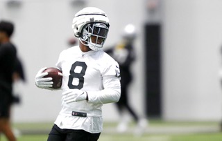 Las Vegas Raiders running back Josh Jacobs (8) runs a drill during practice at the Raiders Headquarters/Intermountain Health Performance Center Wednesday, Aug. 30, 2023, in Henderson.
