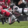 Georgia wide receiver Dominic Lovett (6) is stopped by South Carolina defensive back Jalon Kilgore (24) during the first half of an NCAA college football game Saturday, Sept. 16, 2023.