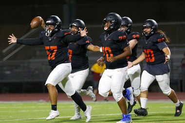 Chaparral players celebrate after defeating Eldorado 32-18 in a high school football game at Chaparral High School Friday, Sept. 22, 2023. 