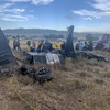 Members of the Truckee Meadows Fire and Rescue Department of California and other officials look over aircraft wreckage, Sunday, Sept. 17, 2023, in Reno, after two California pilots were killed when their planes collided in mid-air while preparing to land after completing a race at the National Championship Air Races north of Reno.
