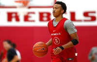 From looking at D.J. Thomas, you wouldn’t know he’s carrying the weight of a storied college basketball program on his slender shoulders. Thomas is relaxed and quick to smile after a recent practice, and why shouldn’t he be? He’s about to suit up for his hometown college for the first time on Wednesday, when UNLV hosts Southern in ...