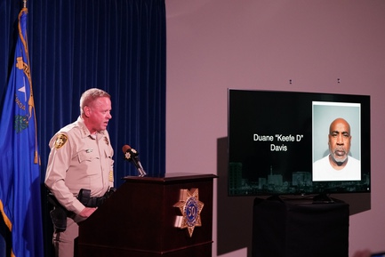 Clark County Sheriff Kevin McMahill details the arrest of Duane “Keffe D” Davis (head shot on television screen) in the deadly 1996 drive-by shooting of Tupac Shakur. A Nevada grand jury indicted Davis on one count of murder with a deadly weapon, Clark County Chief Deputy District Attorney Marc DiGiacomo announced in court Friday.
