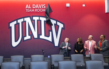 Las Vegas Raiders and UNLV officials unveil a sign during a news conference at the Fertitta Football Complex at UNLV Tuesday, Oct. 3, 2023. From left: Raiders president Mark Davis, Raiders president Sandra Douglass Morgan, UNLV head football coach Barry Odom, and UNLV president Keith Whitfield. The Raiders announced Monday that the organization plans to donate $1 million to the UNLV football program.