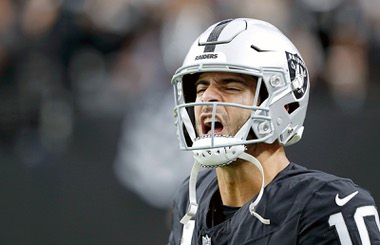 Las Vegas Raiders quarterback Jimmy Garoppolo (10) warms up before an NFL game against the Green Bay Packers at Allegiant Stadium Monday, Oct. 9, 2023.