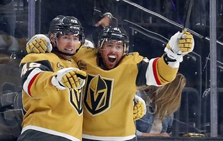 Vegas Golden Knights center Ivan Barbashev, left, celebrates with right wing Jonathan Marchessault after Barbashev's goal in the second period of an NHL hockey game against the Seattle Kraken at T-Mobile Arena Tuesday, Oct. 10, 2023.