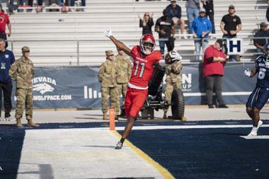 UNLV’s Ricky White reacts against UNR on Saturday, Oct. 14, 2023, at Mackay Stadium in Reno. White caught TD passes of 82 and 59 yards in the first half.