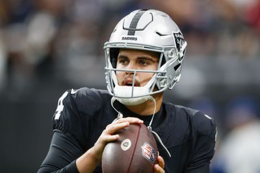 Las Vegas Raiders quarterback Aidan O’Connell (4) warms up before a NFL football game against the New England Patriots at Allegiant Stadium Sunday, Oct. 15, 2023.