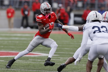 Ohio State receiver Marvin Harrison runs after a catch against Penn State during the first half of an NCAA college football game Saturday, Oct. 21, 2023, in Columbus, Ohio. 