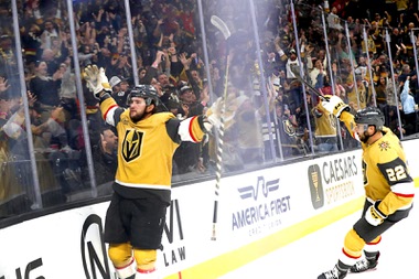 Vegas Golden Knights center Paul Cotter, left, celebrates with right wing Michael Amadio (22) after scoring against the Philadelphia Flyers during the third period of an NHL hockey game at T-Mobile Arena Tuesday, Oct. 24, 2023.
