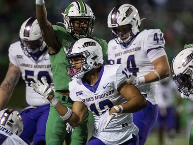 James Madison wide receiver Elijah Sarratt (13) motions after a first down during the second half of an NCAA college football game against Marshall in Huntington, W.Va., Thursday, Oct. 19, 2023.