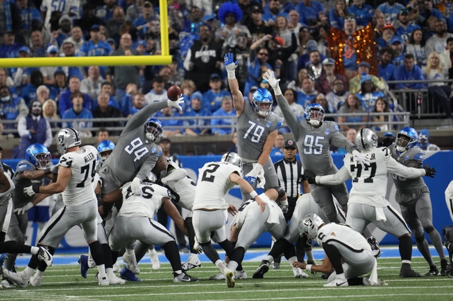 Las Vegas Raiders place-kicker Daniel Carlson (2) kicks an extra point during the second half against the Detroit Lions, Monday, Oct. 30, 2023, in Detroit.


