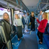 Officials look over the interior of an electric bus during a ceremony at the Nevada Conservation League offices Wednesday, Nov. 1, 2023. From left: Kristee Watson, executive director of the Nevada Conservation League, Congresswoman Dina Titus, D-Nev., Boulder City Mayor Joe Hardy, Dwayne McClinton, director of the Governors Office of Energy, Marie Steele, vice president of Integrated Energy Services at NV Energy, Clark County Commissioner Justin Jones, and M.J. Maynard, CEO at the Regional Transportation Commission of Southern Nevada.