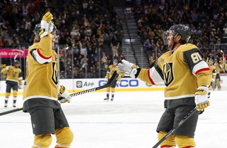 Vegas Golden Knights center William Karlsson (71) congratulates right wing Jonathan Marchessault (81) after Marchessaults empty net during the third period of an NHL hockey game against the Winnipeg Jets at T-Mobile Arena Thursday, Nov. 2, 2023.