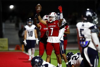 Liberty wide receiver Jayden Robertson (7) celebrates after scoring a touchdown during the second half of a Class 5A-Division I state semifinal high school football game agaisnt Shadow Ridge at Liberty High School Friday, Nov. 3, 2023, in Henderson.