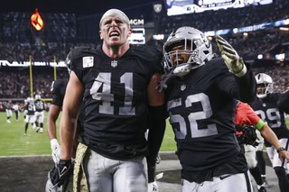 Las Vegas Raiders linebacker Robert Spillane (41) celebrates with Las Vegas Raiders linebacker Malik Reed (52) after Spillane intercepted the ball during the second half of an NFL football game against the New York Jets at Allegiant Stadium Sunday, Nov. 12, 2023.