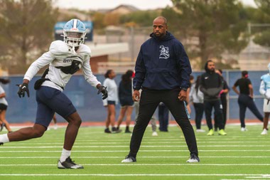 Centennial High School football coach DJ Campbell instructs his team Nov. 15, 2023, in preparation for the Class 4A state championship game.