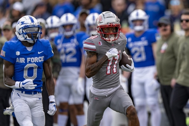 UNLV receiver Ricky White scores on a 78-yard touchdown catch in the first quarter of the team’s 31-27 win at Air Force on Nov. 18, 2023.